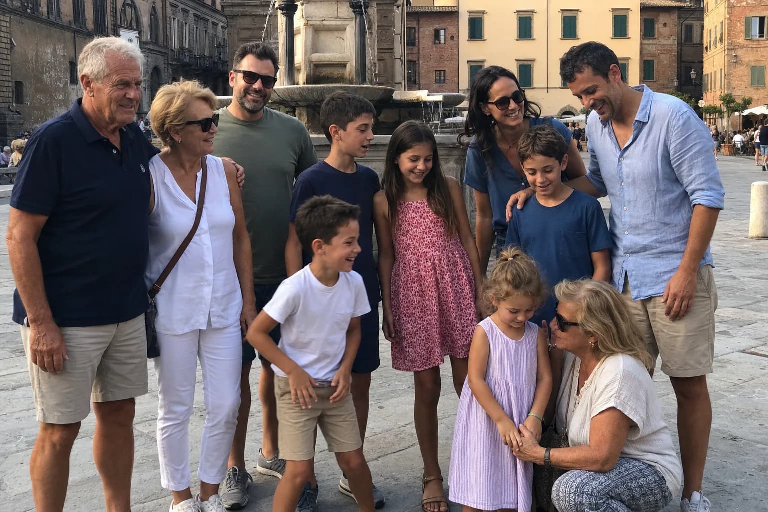 Grandparents, parents and cousins together in an Italian piazza
